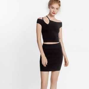 Express asymmetrical off the shoulder cropped top